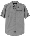 A short-sleeved utility shirt with the full-on complement of pockets, epaulets, zippers, buttons, and grommets in full-on Sean John style.