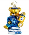 Celebrate two holidays at once with a Christopher Radko ornament made for Hanukkah. A suited-up teddy bear spins a dreidel in mouth-blown, hand-painted glass.