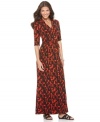 Take your look to new lengths with NY Collection's faux-wrap jersey maxi dress! The bold print was made to turn heads.