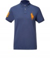 Detailed in breathable and durable cotton mesh, Ralph Laurens big pony polo is a cool modern take on this classic cut style - Small collar, button placket, short sleeves, oversized embroidered polo player at chest, number patch on sleeve, slit sides, high-low hemline - Classic fit - Wear with everything from jeans and sneakers to colored cords and loafers