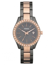 Surrounded by shimmering crystal accents, this elegant yet casual watch from Fossil brings a wonderful change-of-pace to your daily look.