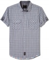 In a cool classic plaid, this Calvin Klein Jeans shirt effortlessly blends into your everyday style.