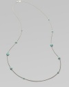 From the Silver Wonderland Collection. A long, lovely sterling silver chain is brightly dotted with faceted turquoise in an array of sizes. Turquoise Sterling silver Length, about 38 Lobster clasp Imported