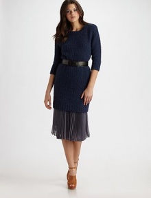 A nubby wool knit crafted in an cozy sheath silhouetteJewel necklineThree-quarter sleevesRibbed trimPullover styleAbout 21 from natural waist75% wool/25% polyamideDry cleanImported