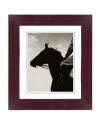 Kentucky-born thoroughbred and Triple Crown champion Gallant Fox races out of the starting gates in this handsome art print from Lauren Ralph Lauren. A mahogany wood frame completes the piece with sophisticated polish.