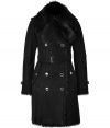 The ultimate investmentthis ultra-luxe double-breasted shearling coat from Burberry London will elevate your cold weather style - Large fur spread collar, epaulets, long sleeves with belted cuffs, double-breasted front button placket, belted waist, flap pockets, fitted silhouette - Wear with skinny jeans and a cashmere pullover or a fitted cocktail sheath