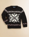 An essential snowflake crewneck sweater is rendered with an intarsia-knit motif for seasonal style.CrewneckLong sleevesPullover styleRibbed collar, cuffs and hemCottonMachine washImported