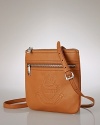 In rich pebbled leather, this compact crossbody from Lauren by Ralph Lauren makes a classic case for downsizing. In a just right size, this bag proves less is really more.