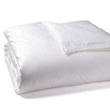 Crisp and bright, this Hudson Park Luxe duvet boasts a polished, geometric weave in shimmery white on white. Elegantly minimalist styling lets the luminous pattern shine through.