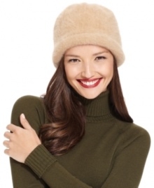 Top off your everyday look with this cozy angora cap from Nine West that keeps the cold from cramping your style.