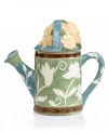 Pour on the charm with a Painterly Bouquet teapot, featuring a whimsical watering can shape and white blooms in hardy stoneware. A cute gift for fellow tea drinkers. From Pfaltzgraff.