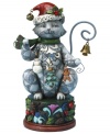 With bells on. Clawing her way to the top of your tree, Jim Shore's Christmas cat carries a few ornaments of her own – a snowman, tree and gingerbread man – and sits up on a pedestal of holly and pine cones.