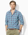 A bold, bright plaid enlivens a trim-fitting workshirt in soft, dobby-woven cotton.