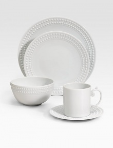 An elegantly detailed place setting is made entirely by hand in fine Limoges porcelain with a raised pearl border. Set includes dinner plate, dessert plate, cereal bowl, saucer and mug. From the Perlee White Collection Porcelain Dinner plate, 10½ diam. Dessert plate, 8¾ diam. Cereal bowl, 3H X 5½ diam. Saucer, 6½ diam. Mug, 3½H X 4¾ diam. Dishwasher safe Imported 