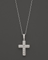 Petite diamond pavé-set cross pendant set in 14K. white gold.