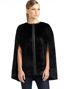 THE LOOKPlush faux fur in a swirly textureSmooth contrast trim along the neck and center placketFront pin closureCape sleevesTHE FITAbout 27 from shoulder to hemTHE MATERIALFaux fur: viscoseBacking: viscose/cotton/modalCARE & ORIGINDry cleanImportedModel shown is 5'11 (180cm) wearing US size Small. 