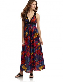 THE LOOKVibrant flower printContrast banded V-neck and Empire waistPleated center waistSide zipperCrossback strapsTHE FITAbout 52 from shoulder to hemTHE MATERIALCottonCARE & ORIGINHand washImportedModel shown is 5'11 (180cm) wearing US size Small. 