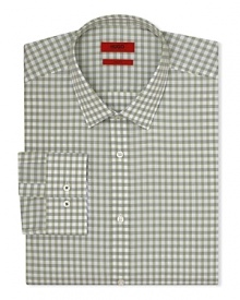 A slim-fit HUGO dress shirt touts traditional barrel cuffs and a check pattern for streamlined office polish.