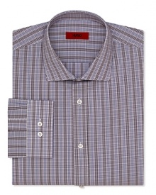 A classic-fit HUGO dress shirt touts traditional barrel cuffs and timeless plaid for effortless office polish.