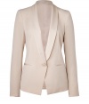 With its sharply tailored fit and timeless classic styling, DKNYs pristine tuxedo blazer is a workweek essential - Satin shawl lapel, long sleeves, single button closure, satin trimmed front slit pockets - Tailored fit - Pair with a sheath dress for cocktails, or for work with a pencil skirt and peep-toes