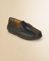 This supple leather, classic slip-on features patented breathable technology that absorbs and expels sweat, while keeping out water.Slip-on style Leather upper Rubber sole Padded insole Leather lining Imported