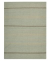 Subtle striping gives way to understated sophistication in the Horizon area rug from Calvin Klein. Generously thick wool fibers are hand tufted in India for remarkable strength and detailed design. Perfect for mixing with any style decor.