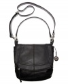 A zip flap adds edgy zest to the classic pebbled texture and bucket silhouette of The Sak's Silverlake handbag.