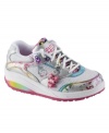 She'll love fastening on the glitzy fun of these sparkling Stride Rite sneakers featuring the Glitzy Pets.