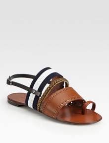 Perforated, braided leather straps accompanied by a nautical canvas strap and a unique toe ring. Leather and canvas upperLeather lining and soleMade in ItalyOUR FIT MODEL RECOMMENDS ordering one half size up as this style runs small. 