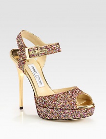 Look party-perfect wearing this multicolored glitter silhouette with a sky-high heel and platform. Lacquered heel, 5 (125mm)Glitter-coated fabric platform, 1 (25mm)Compares to a 4 heel (100mm)Glitter-coated fabric upperAdjustable ankle strapLeather lining and solePadded insoleMade in Italy