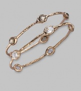 Five faceted ovals of shimmering clear quartz sit within a hammered bangle of 18k gold and sterling silver with a glowing finish of 18k rose goldplating. Clear quartz An alloy of 18K gold and sterling silver plated with 18K rose gold Diameter, about 2¾ Imported Please note: Bracelets sold separately.