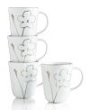 Wildflowers gleam in polished platinum, adding whimsical glow to the Grand Buffet Platinum Silhouette mugs. A banded edge adds a classic touch to a pattern with modern spirit.