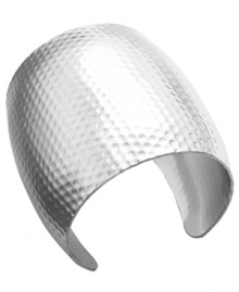 Cuff love! Everyone's trending this latest craze. INC International Concepts' standout style feature an intricate textured surface set in silver tone mixed metal. Cuff bracelet slips over the wrist for effortless style. Approximate diameter: 2 inches.