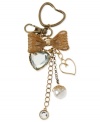 Carry your keys in style with this chain from Betsey Johnson. Crafted from antique gold-tone mixed metal, the key chain is adorned with a glass crystal heart, a ribbon and other glistening accents. Item comes packaged in a signature Betsey Johnson Gift Box. Approximate drop: 2 inches.