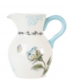 A beautiful blossom unfolds across this whimsical pitcher from Edie Rose by Rachel Bilson. Coordinate with other Rose dinnerware and serveware to create your own garden variety.