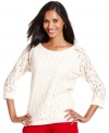 Sheer lace sleeve accentuate the ladylike overlay on Style&co.'s latest petite top.