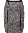 Work a lady-chic edge into your contemporary tailored look with DKNYs optical tweed skirt - Black trim, hidden back zip, kick pleat - Paneled, form-fitting silhouette - Team with blazers, feminine tops, and chic streamlined accessories