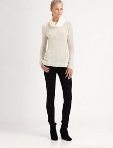 A slouchy turtleneck style crafted from extra-fine cashmere knit.Draped turtleneckRaglan sleevesRibbed trimPullover styleAbout 26 from shoulder to hemCashmereDry cleanImportedModel shown is 5'11 (180cm) wearing US size Small.This style runs true to size. We recommend ordering your usual size for a standard fit. 