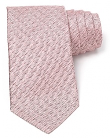 A textural pattern tie in an understated color resolves your workday attire with simple refinement.