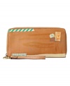 This well-traveled style by Fossil will keep your cards and bills organized with a worldy flair. Postage patches and accents add a unique charm to this convenient zip around wallet.