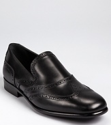 From Salvatore, an elegant loafer crafted from fine Italian leather accented with classic wingtip perforations.