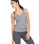 Get active in this easy crossback tank top from Ideology. Chic stripes add style; a built-in shelf bra lends support!