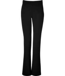 Luxurious pants made ​.​.of fine black wool stretch - New elegant silhouette, slim with slightly flared legs - High waisted fit and flat front - Side zip - A classic AND modern look that works great for the office, leisure and evenings - Looks grown up, professional and dressy - A basic piece, suitable for blouses, tops, cardigans