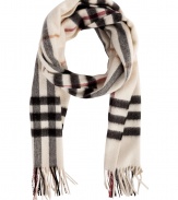 Finish your look on an iconic note with Burberry Londons giant check scarf, detailed in brushed cashmere for luxuriously cozy results - Fringing at both ends - Wear inside over bright knit sweaters, or outdoors over classic coats with leather gloves