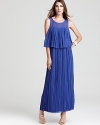 This intricately pleated, two-tiered Max & Cleo gown borrows from the '70s while maintaining it thoroughly modern roots.