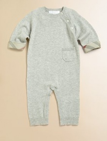 Snuggle your little one into a sweater-soft coverall in a luxurious blend of cashmere and cotton with check trim.Ribbed crew necklineLong raglan sleeves with buttons at one seamChecked turn-back cuffsOne patch pocketSnap legs with ribbed cuffs50% cashmere/50% cottonDry cleanImported Please note: Number of buttons and snaps may vary depending on size ordered. 