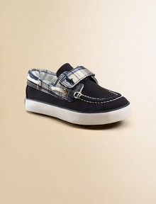 Classic boat shoes get a stylish update with grip-tape closure, lace trim and an embroidered pony.Hook-and-loop grip-tape closureCotton canvas upperPlush terry liningRubber solePadded insoleImported