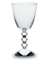 The Vega Stemware Collection will make a unique and striking addition to your finely set table. Each piece features a neck lined with thick connecting diamond-shaped glass studs leading fron the commanding sturdy base to the simple bulb, lending a look that has the timeless effect and appeal of glittering diamonds.