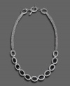 Dreamy design with artistic flair, by Monet. This gorgeous necklace features faceted glass beads set in silvertone mixed metal with pave crystal accents. Approximate length: 16 inches.