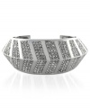 Show your daring side with this bracelet from Vince Camuto. Crafted from silver-tone mixed metal, the chevron-styled cuff glistens with crystal pave accents for an elegant touch. Approximate length: 6 inches.